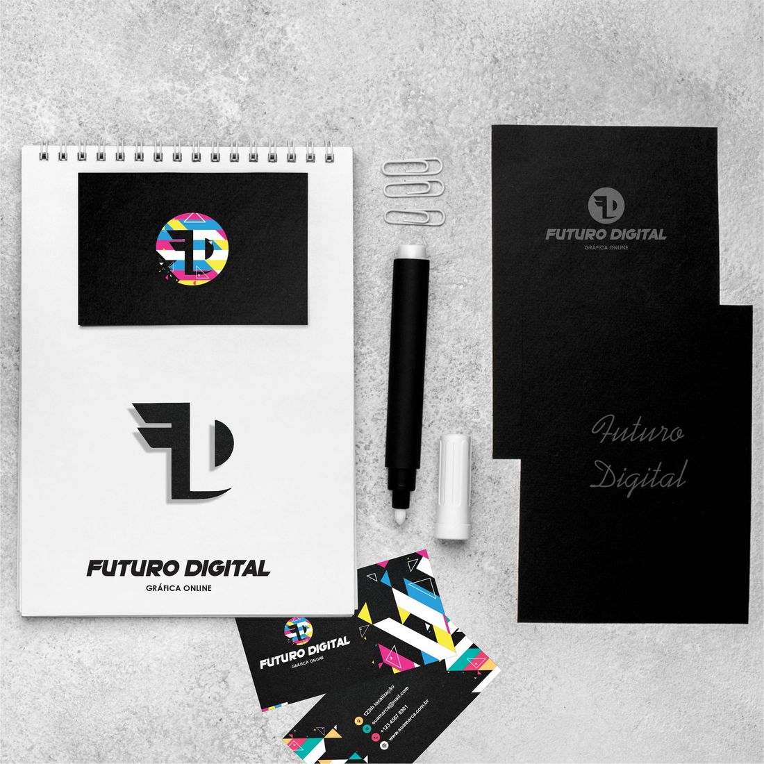 Bloco, cartões de visita e pasta com a identidade visual da Futuro Digital